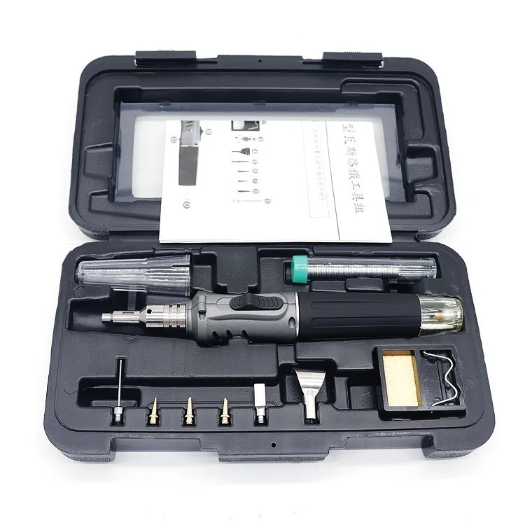 A cordless butane torch soldering iron kit with multiple attachments, designed for professional use.
