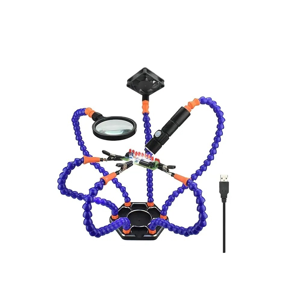 A TekDep PCB holder with six flexible arms, featuring clips, a USB fan, rechargeable flex-light, and magnifying glass tip attachments, designed for precision soldering tasks.