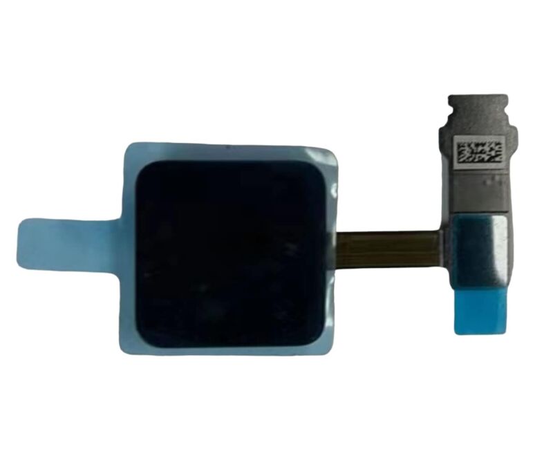 Close-up of a replacement power button for the 2018-2019 Apple MacBook Pro with a Touch Bar, 16-inch model.